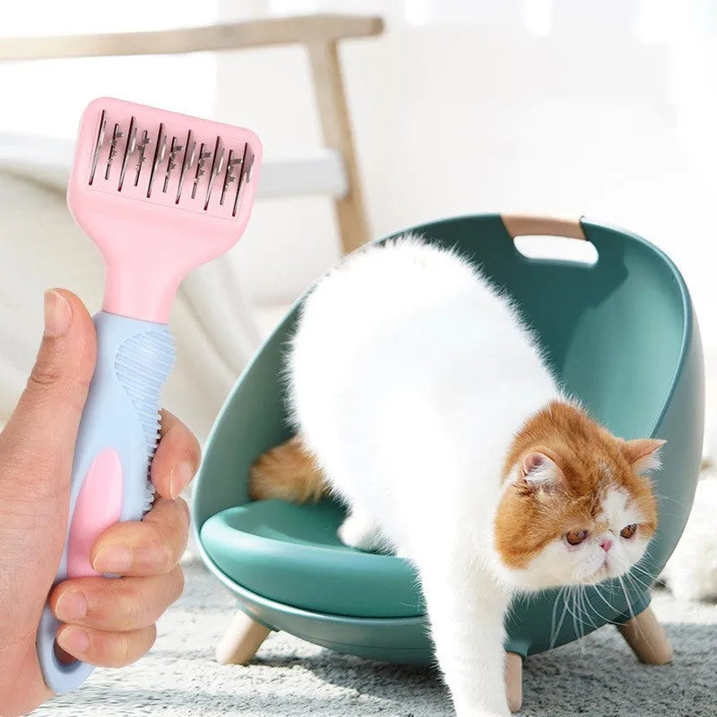 Stainless steel pet grooming comb with pink rubber handle for dogs and cats