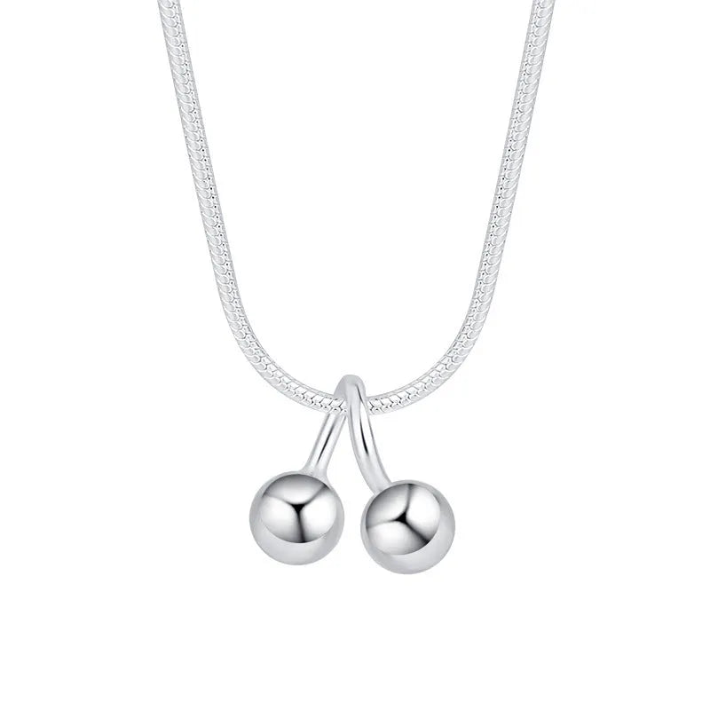 Silver cherry necklace on snake bone chain, adjustable length, Korean style jewellery for women.