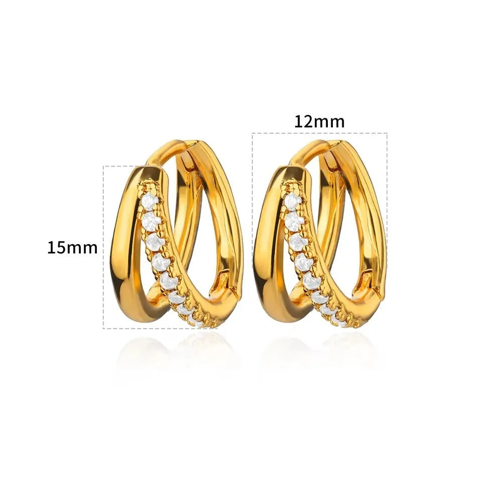 Geometric butterfly earrings with heart and star shapes in copper with diamond treatment