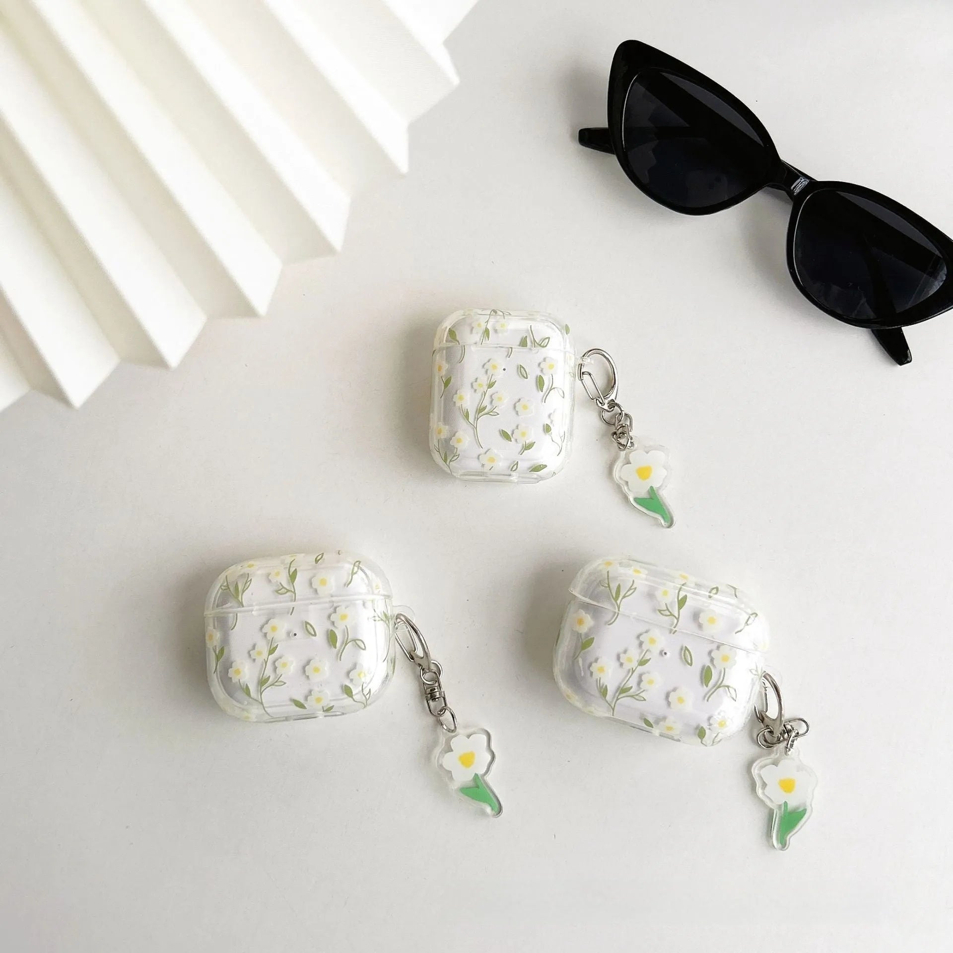 Transparent TPU Bluetooth headset protective cover with white floral design for Apple AirPods