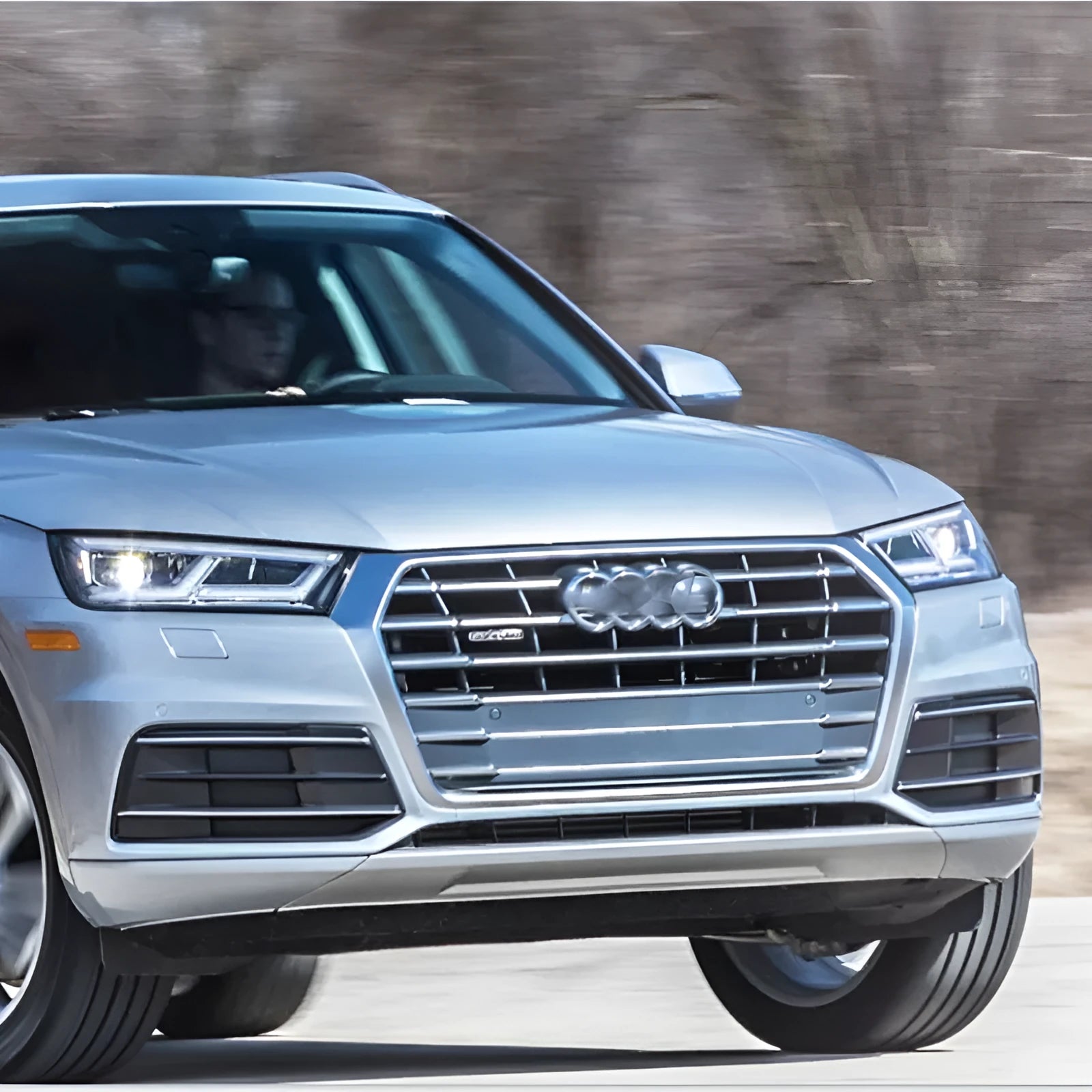 Black ABS front bumper lower grille for Audi Q5 2018-2022 models showing left and right fog light frames