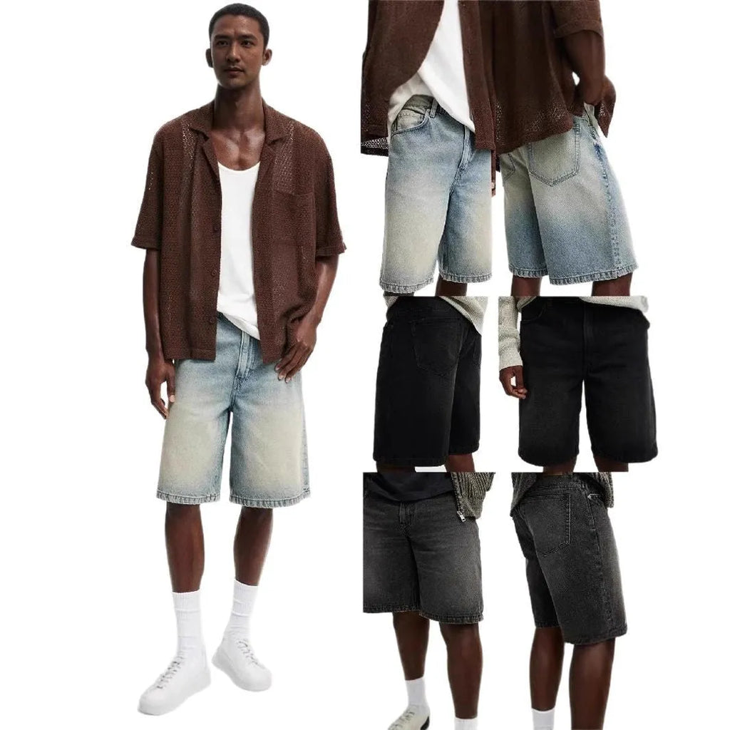 Men's loose fit light blue straight leg cotton jeans on a hanger.