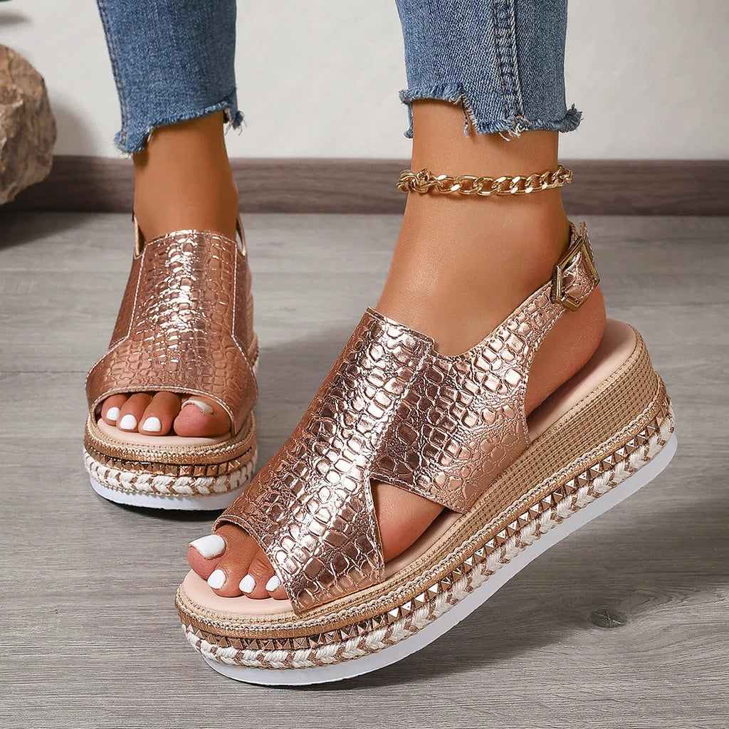 Gold roman sandals with round toe, ankle buckle, and hollow-out patterns on PU upper