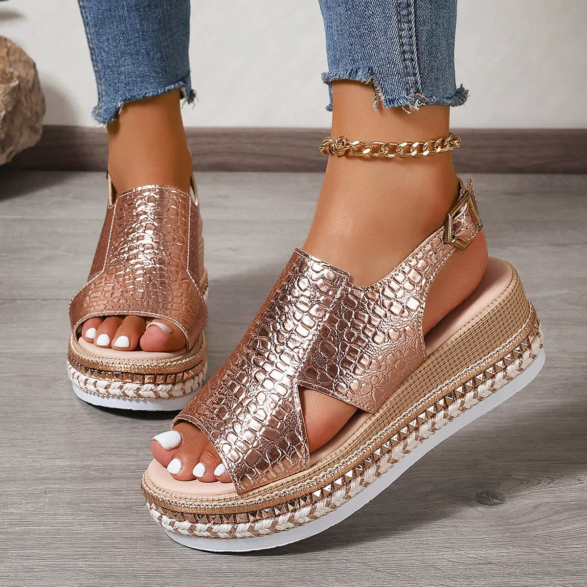 Gold roman sandals with round toe, ankle buckle, and hollow-out patterns on PU upper