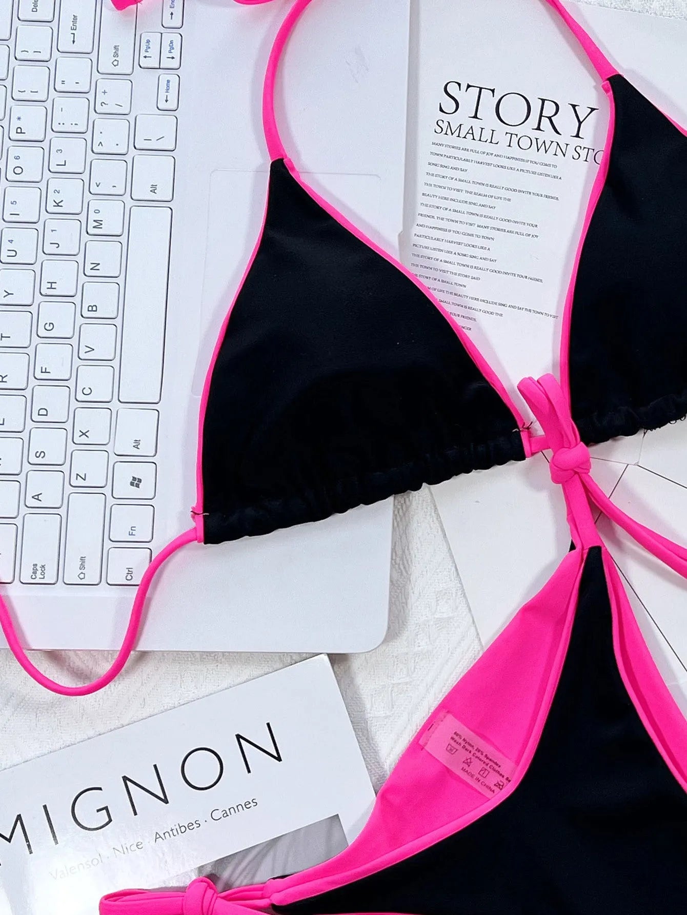 Women's black bikini swimsuit with chest padding and high-cut briefs