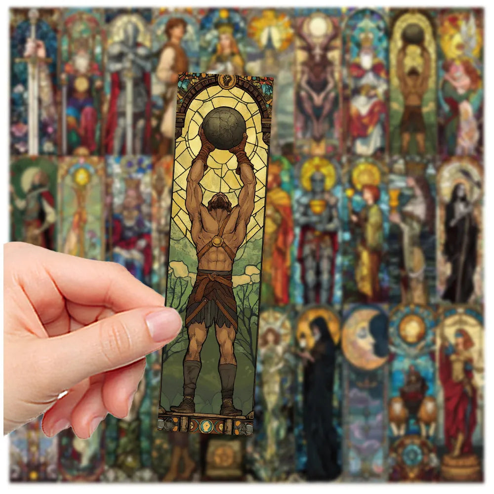 Set of 30 colourful hand-painted tarot card design paper bookmarks laid out flat.