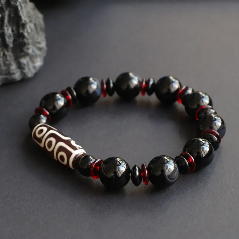 Hand-woven black agate dzi bead bracelet with 11mm geometric beads