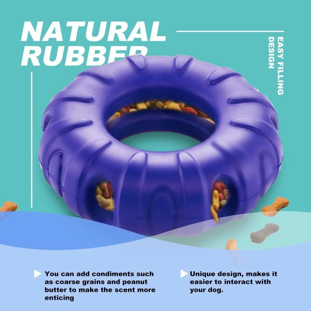 Blue natural rubber tyre-shaped dog chew toy with oval openings for treat dispensing