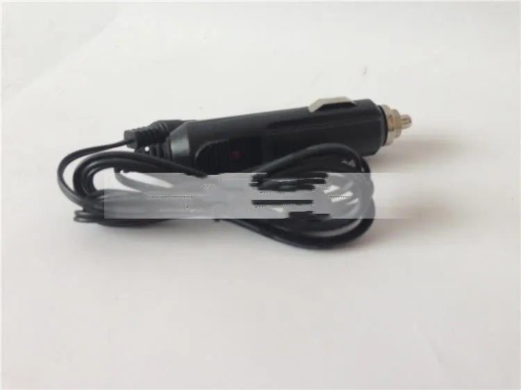A compact dual USB car charger for 12V and 24V vehicles with a cigarette lighter plug.