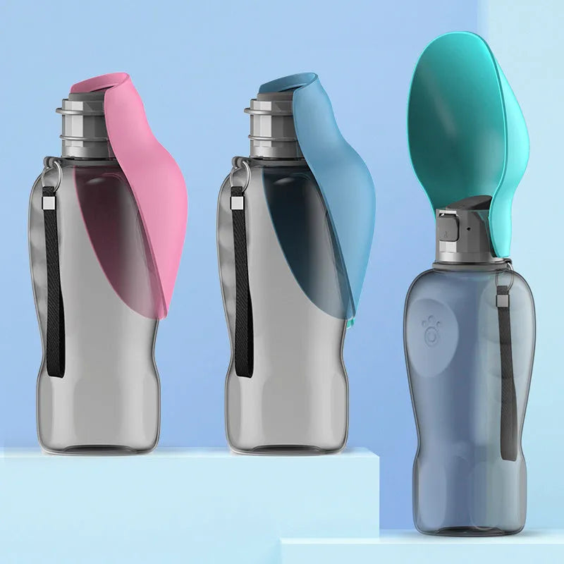 Blue-grey foldable dog water bottle with drinking trough open, showing wrist strap and lock key.