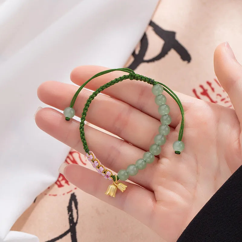 Hand-woven red rope bracelet with lily flower design, women's national style wrist accessory