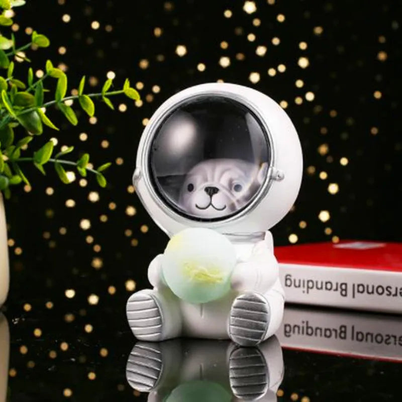 Resin animal night light in bear design with starry sky LED glow on a table.