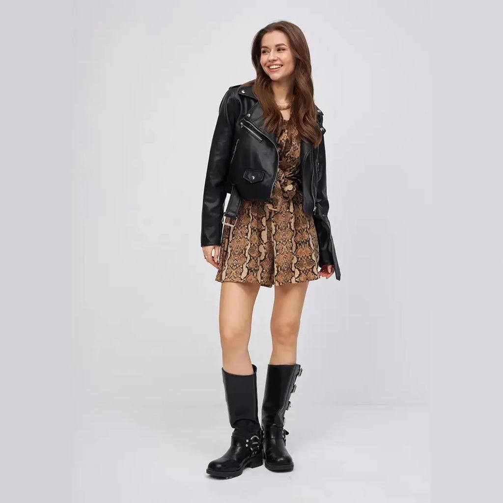 Black women's PU leather retro coat with regular sleeves on hanger
