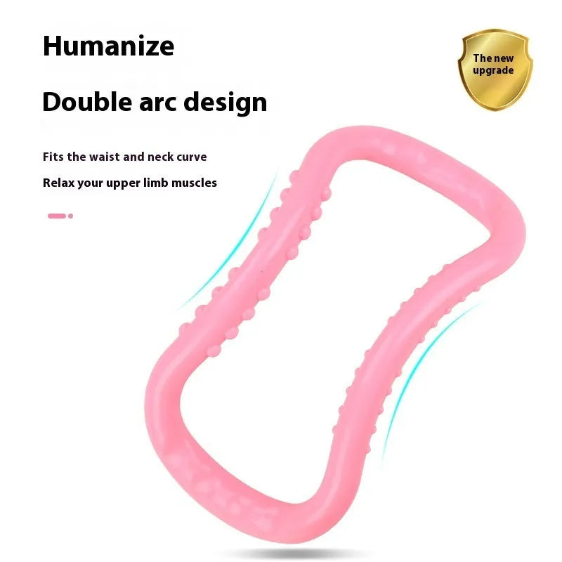 A purple, blue, or pink PP plastic yoga ring used for stretching and back opening exercises.