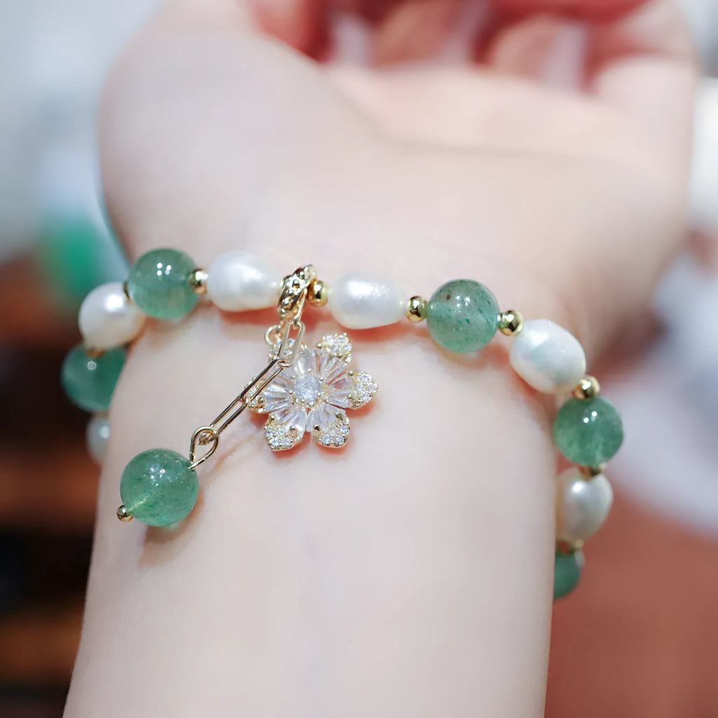 Green handmade freshwater pearl bracelet with strawberry pearls and Chinese knot design