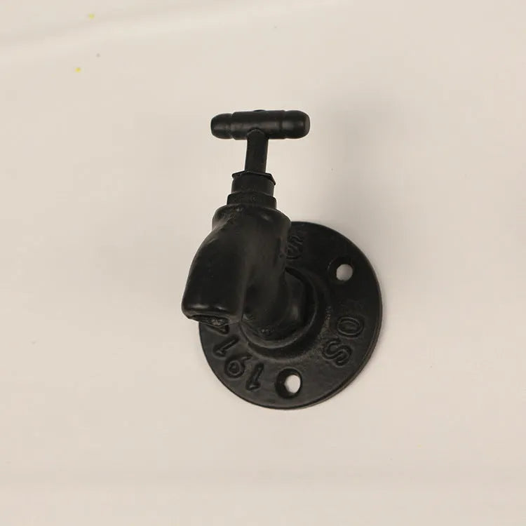 Water pipe style metal wall hanging hook in polished finish for towel organisation
