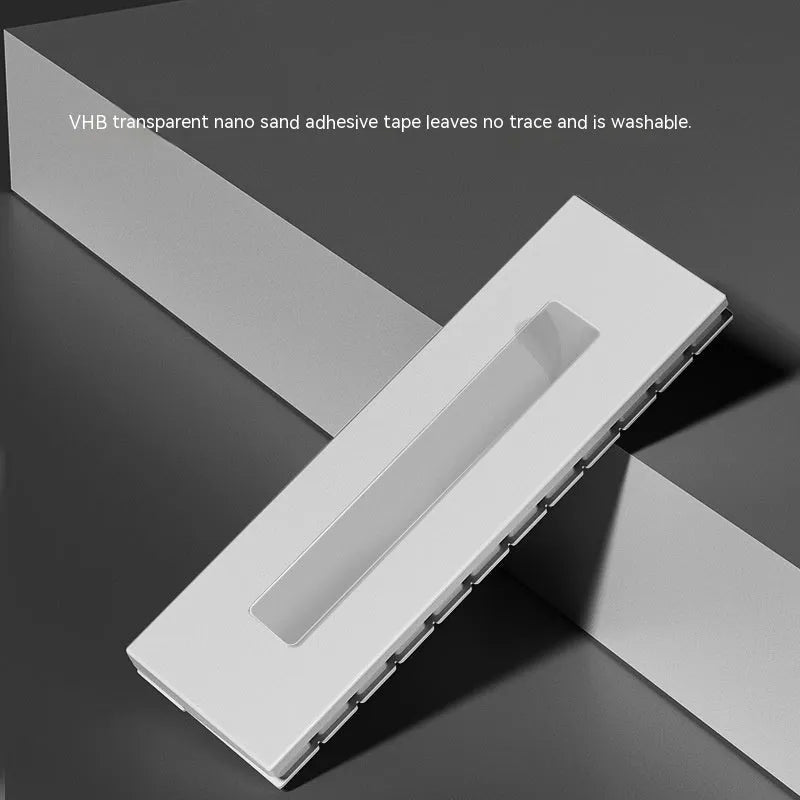 Black and white plastic piano-shaped temporary parking sign for car dashboard.