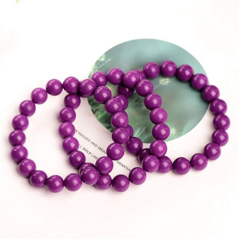 Jiuya purple mica crystal bracelet with polished beads in an original unisex design.