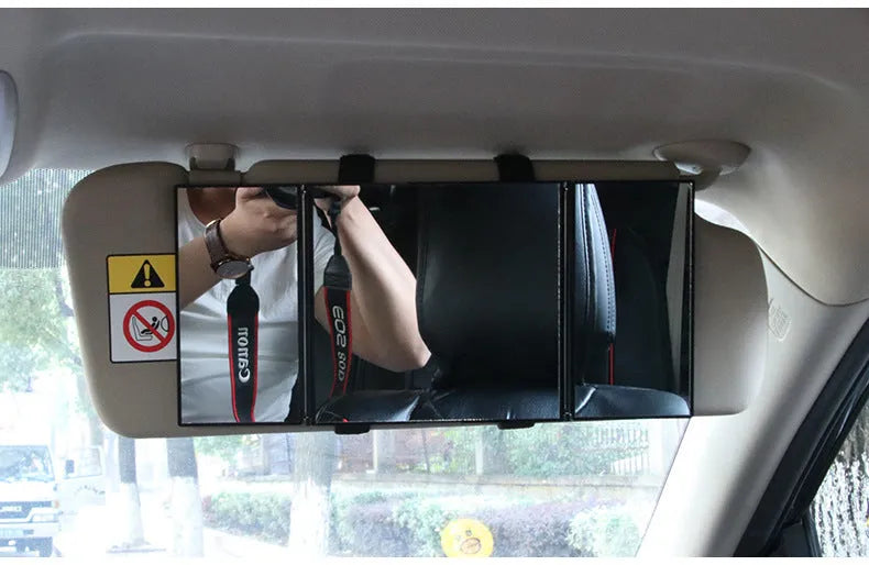 Silver car folding makeup mirror shown both closed and open with dimensions