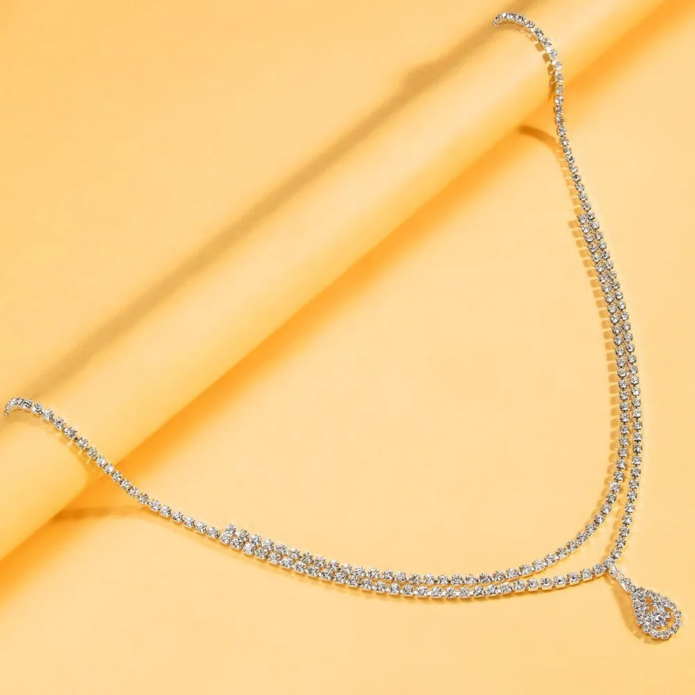 Gold rhinestone water drop pendant waist chain with lobster buckle closure