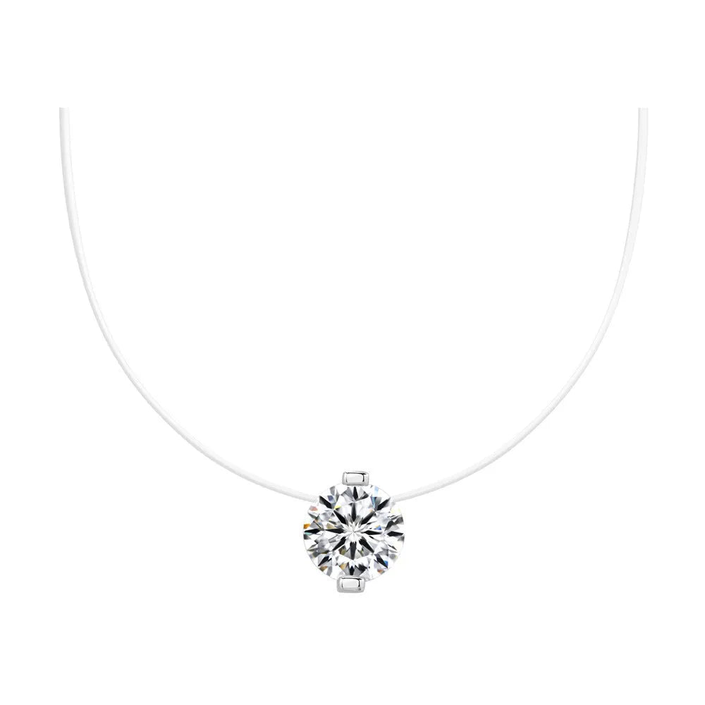 Close-up of a silver plum blossom pendant necklace with a moissanite stone set on an invisible fishing line.