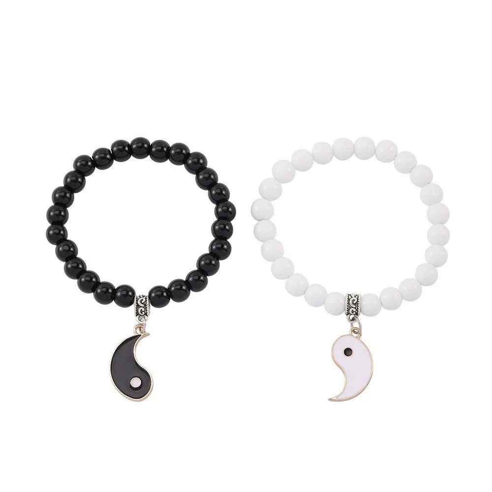 Unisex eight-diagram-shaped alloy bracelet with electroplated finish.