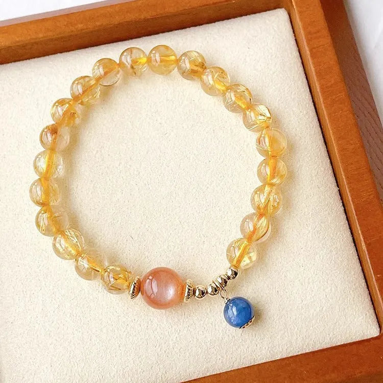 Gold rutilated quartz sunstone crystal bracelet with round diamond-shaped beads