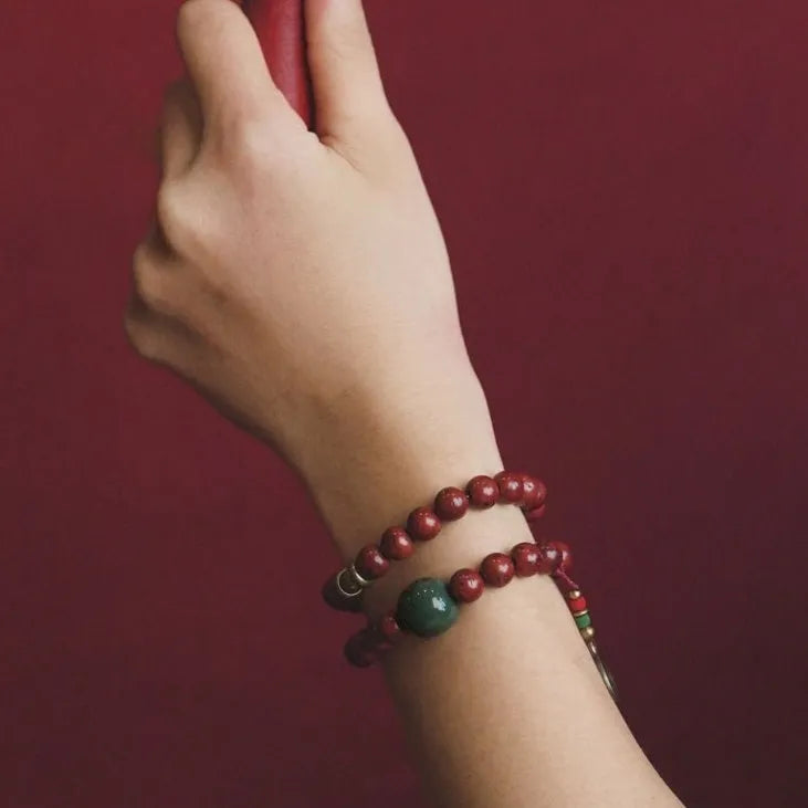 Natural bodhi seed double circle bracelet with cartoon style elements on wrist