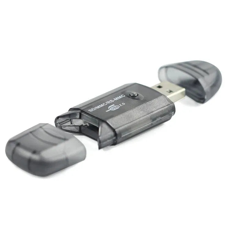 Transparent USB card reader with LED light option on desk next to memory cards