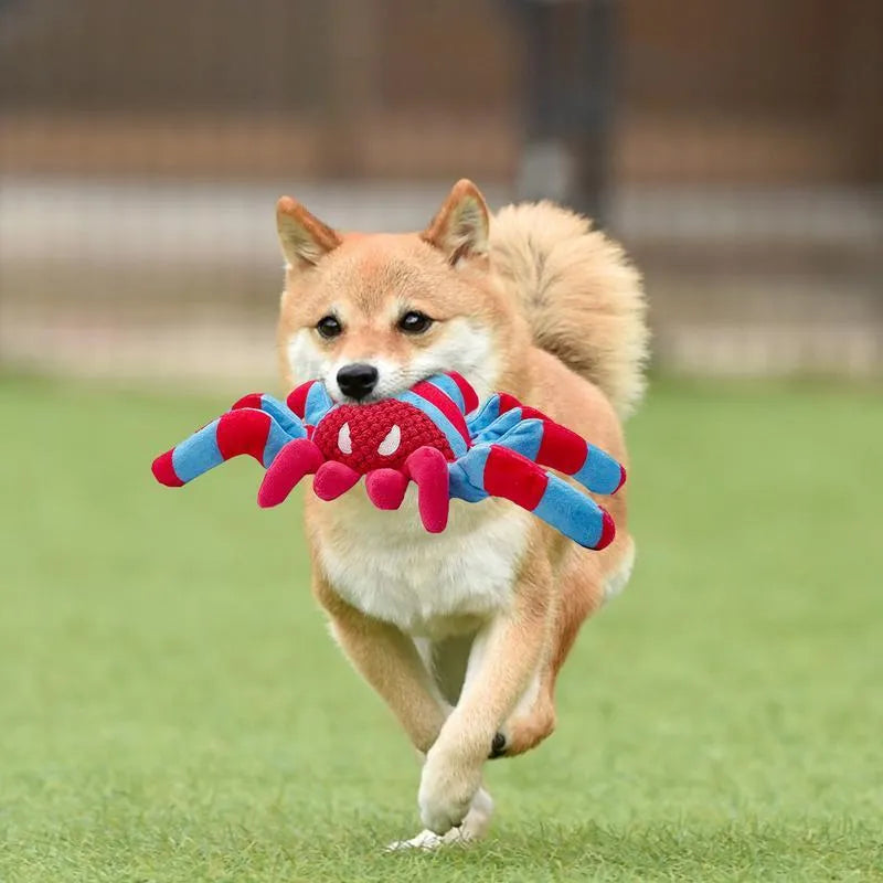 Red plush teddy dog toy with bite-resistant construction and tooth-cleaning ridges