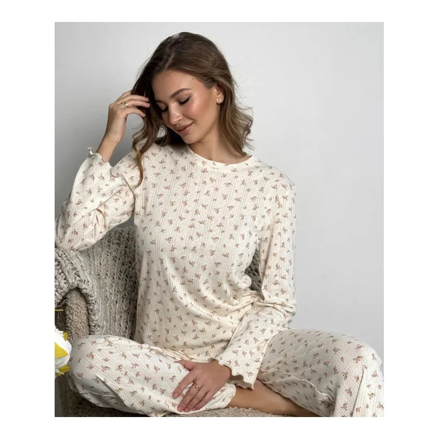 White floral print women's suit with long bell sleeve top and wide-leg trousers