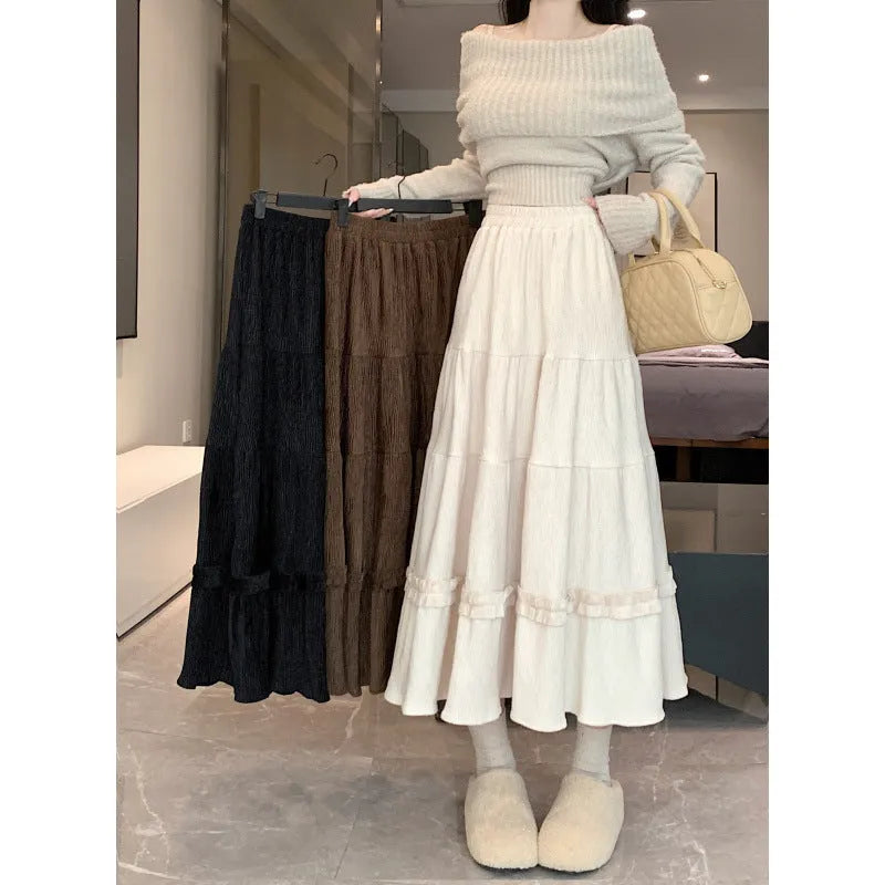 Women's corduroy A-line midi skirt with elastic waistband in milky white, black, or brown colours