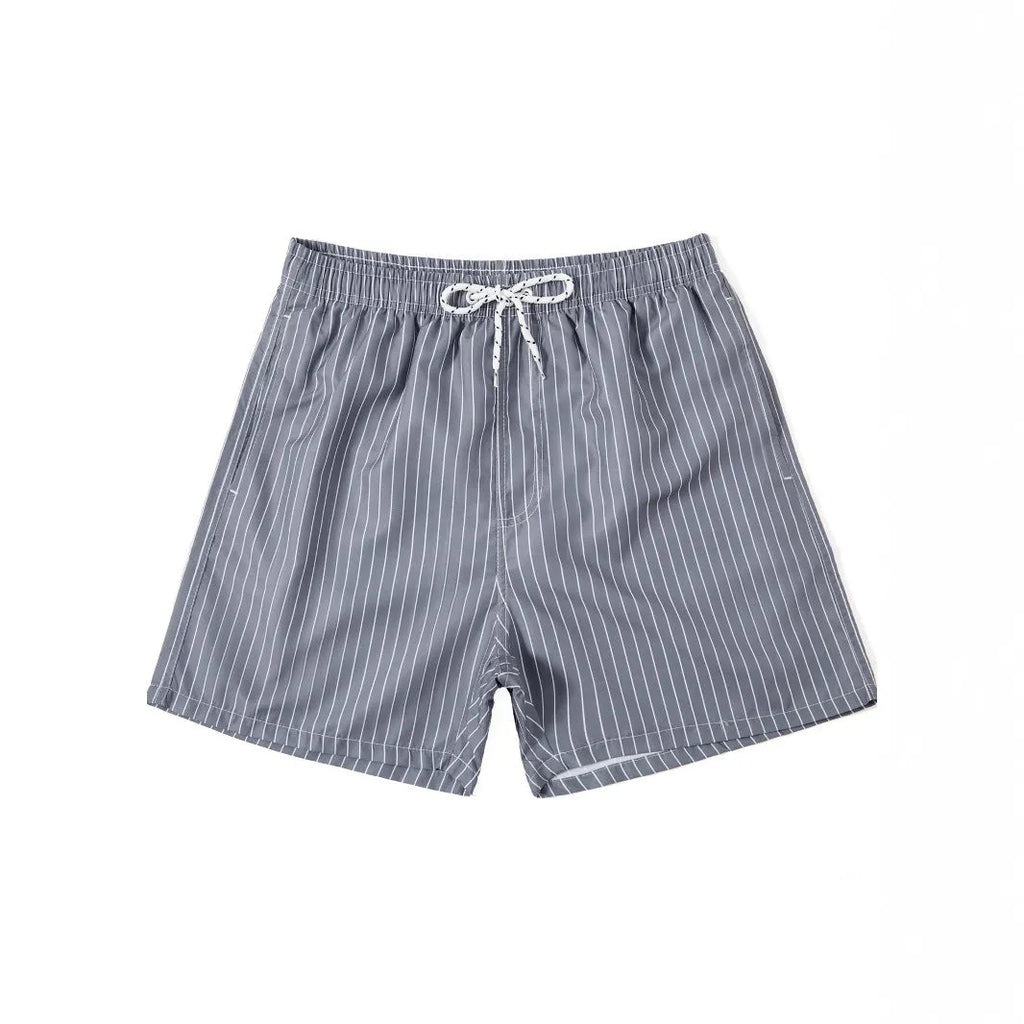 Men's navy blue and grey striped polyester beach shorts with straight leg opening.