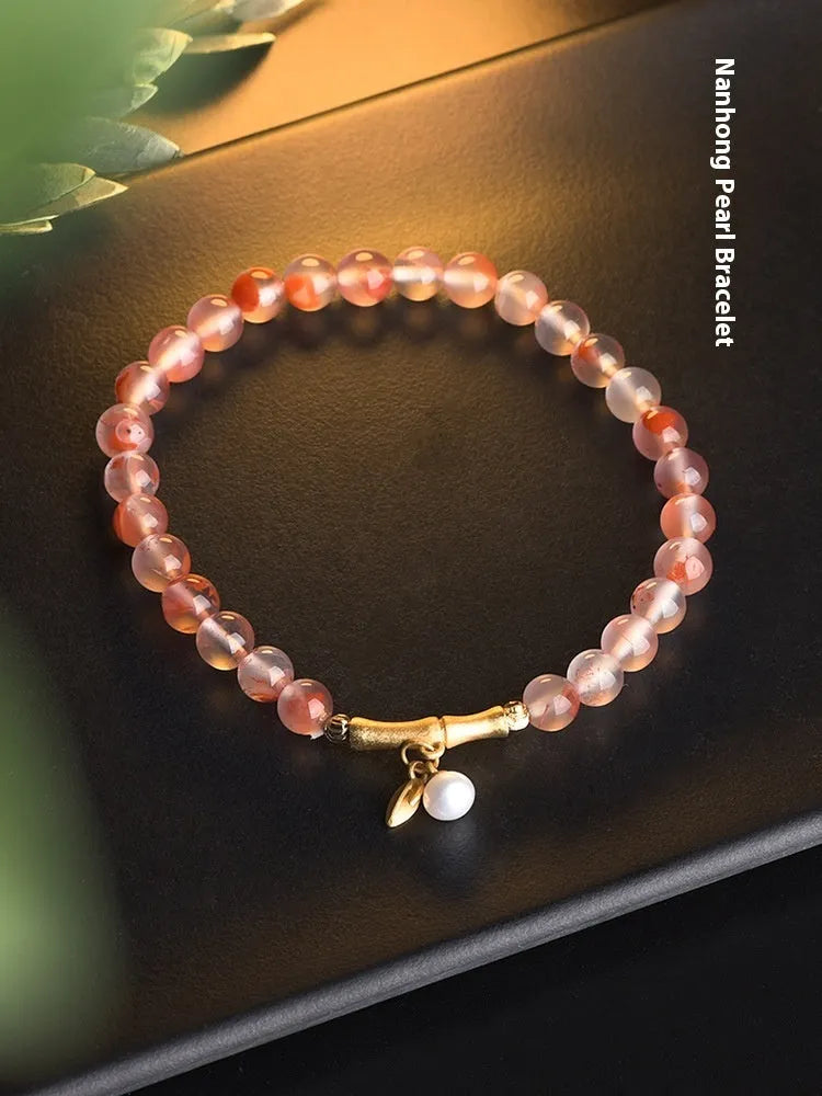 Agate ethnic bracelet with flower shape and bamboo joint design in Hetian Jade colour.
