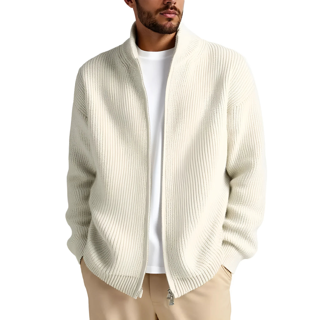 Man wearing a loose-fit grey cardigan sweater coat, showing the relaxed silhouette and knit texture.