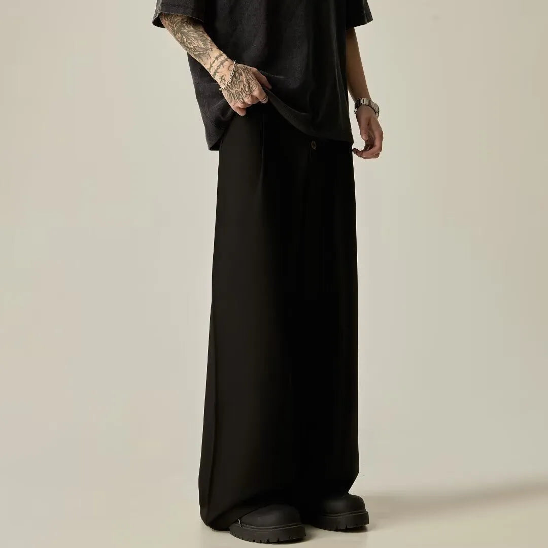 Men's solid colour wide-leg trousers with elastic waistband in black and brown options