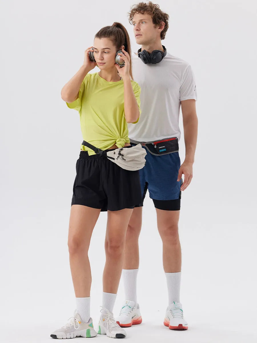 Men's straight-leg sports shorts with side slits in turmeric yellow colour, showing athletic design with micro elastic nylon fabric