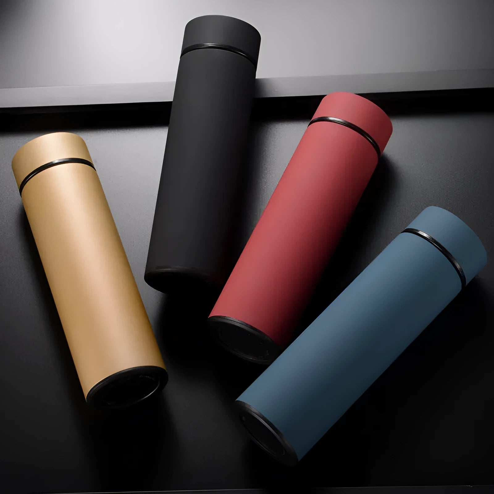 450ml stainless steel vacuum insulated water bottle in black, red, gold, or blue colour.