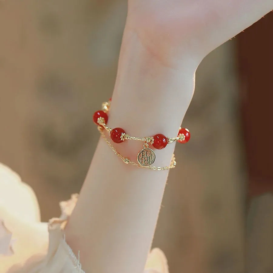 Women's red agate and alloy Hongma lucky card double-layer bracelet in gift box.