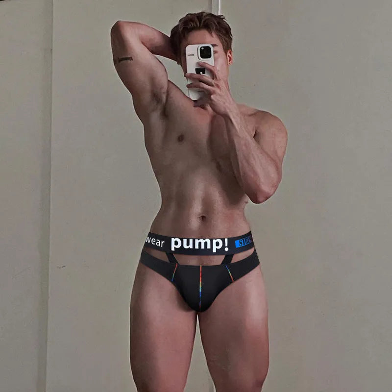 Men's solid black low-waist modal fabric briefs laid flat, showing the waistband and leg openings.