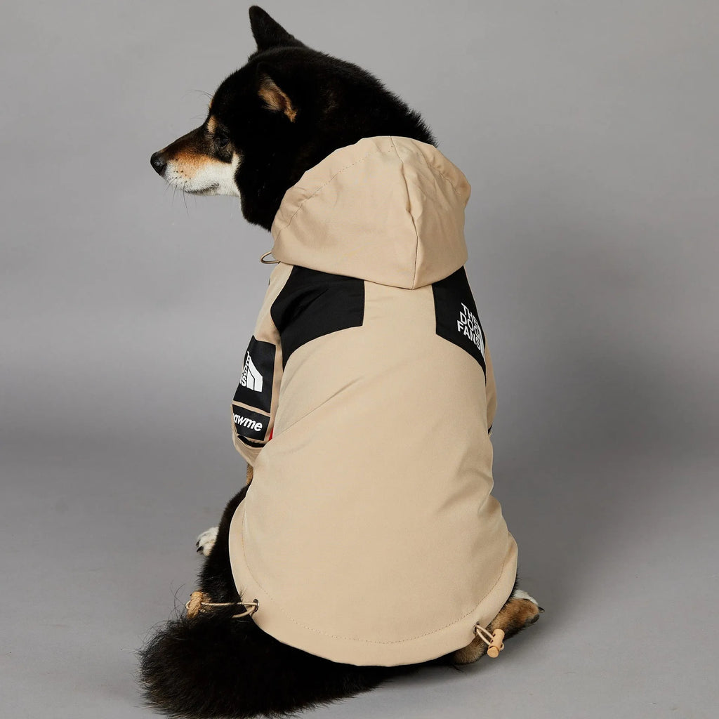 Khaki coloured polyester dog shell jacket shown on a model dog.