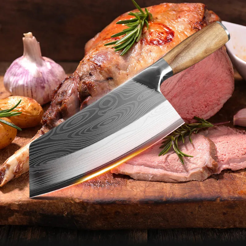 A 320mm long stainless steel kitchen knife with a forged blade on a wooden cutting board.