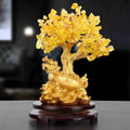 Resin Feng Shui ornament of a citrine small water turtle money tree, Chinese style.