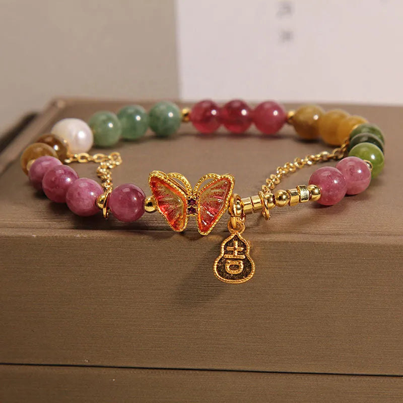 Natural jade coloured agate bracelet with a butterfly gourd design for women.