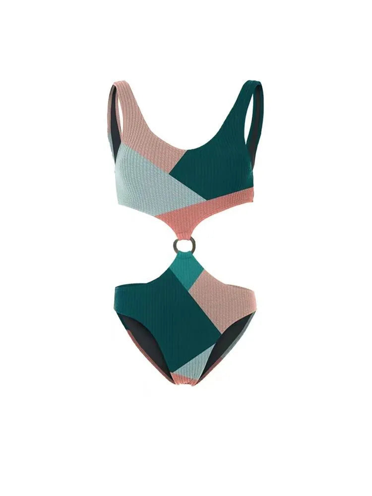 Contrast colour bikini two-piece set with a light mesh gauze skirt laid flat.
