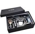 CSB shaving set with chrome stand holding a double edge safety razor and a badger hair brush, with a zinc alloy soap bowl and blades.