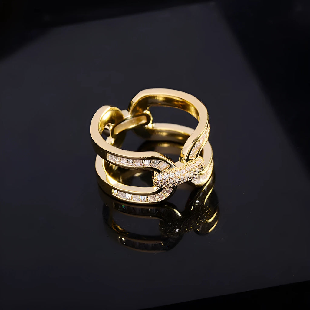 Round copper scarf ring with electroplated gold finish, geometric shape, on a silk scarf