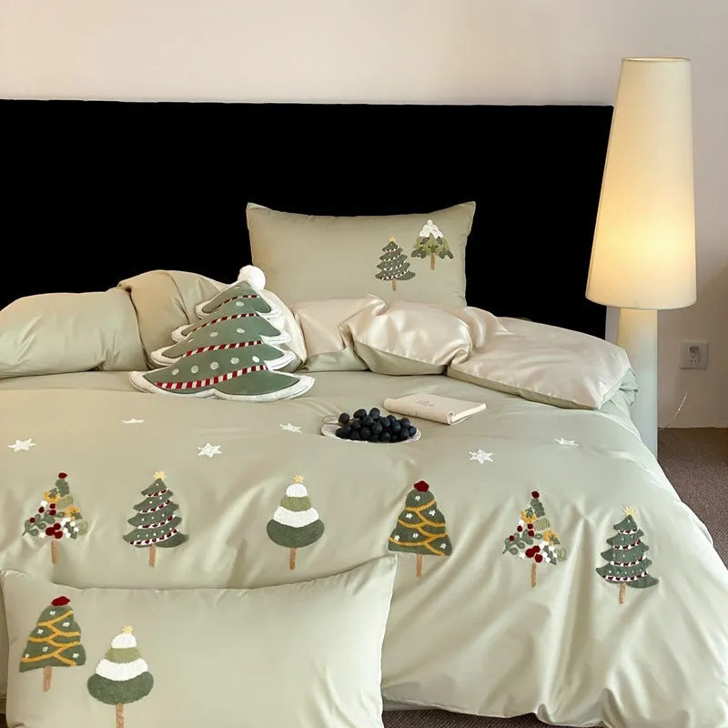 Pure cotton duvet cover and pillowcases with embroidered Christmas tree and floral pattern.