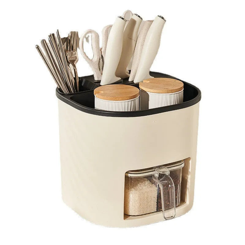 White rotating kitchen storage bucket with attached four-compartment spice box for utensils and seasonings.