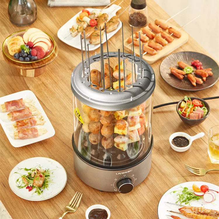 Household electric barbecue oven with automatic rotation, 210mm diameter, 1100W, on a kitchen counter